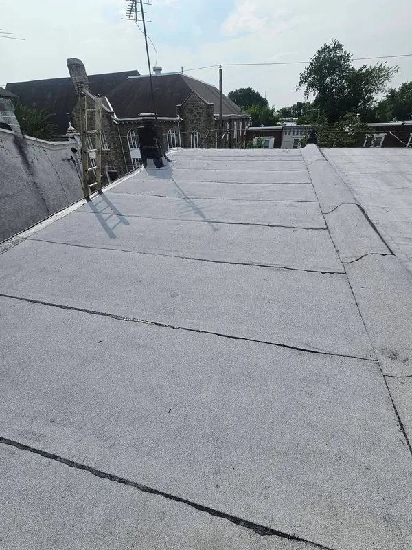New flat roof membrane on a Brooklyn row house