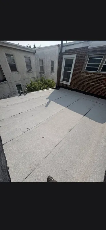 Rear extension flat roof, resurfaced