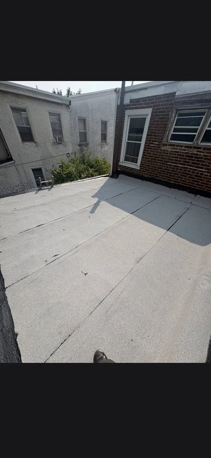 Flat roof over a rear extension in Brooklyn