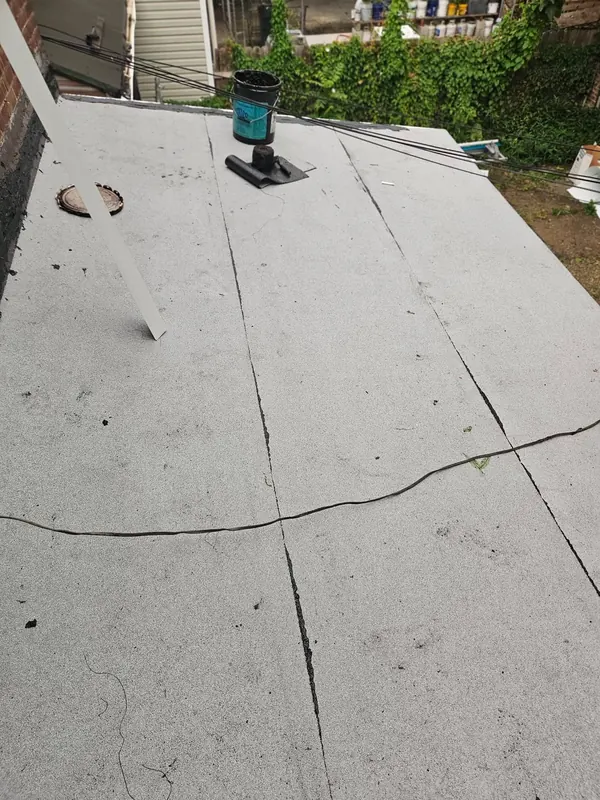 Torch-down seam work on a Brooklyn flat roof