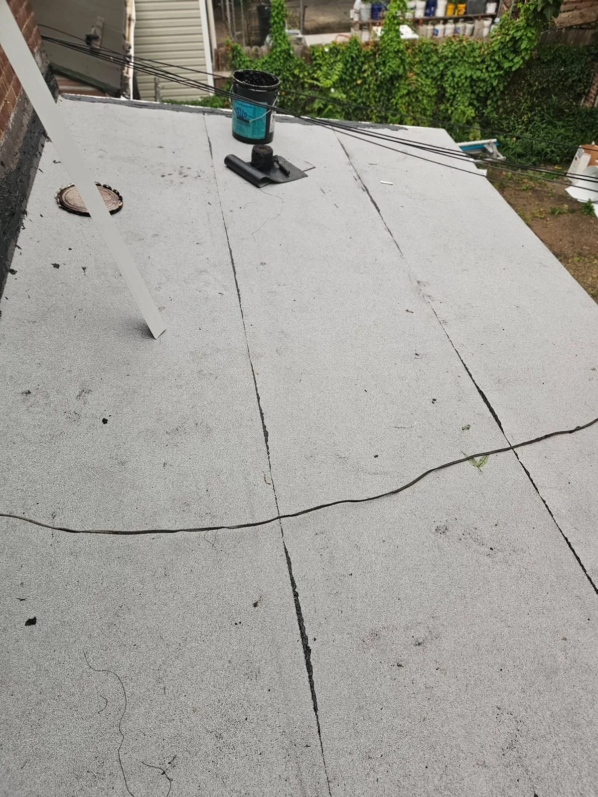 Commercial flat roof seam work in Brooklyn