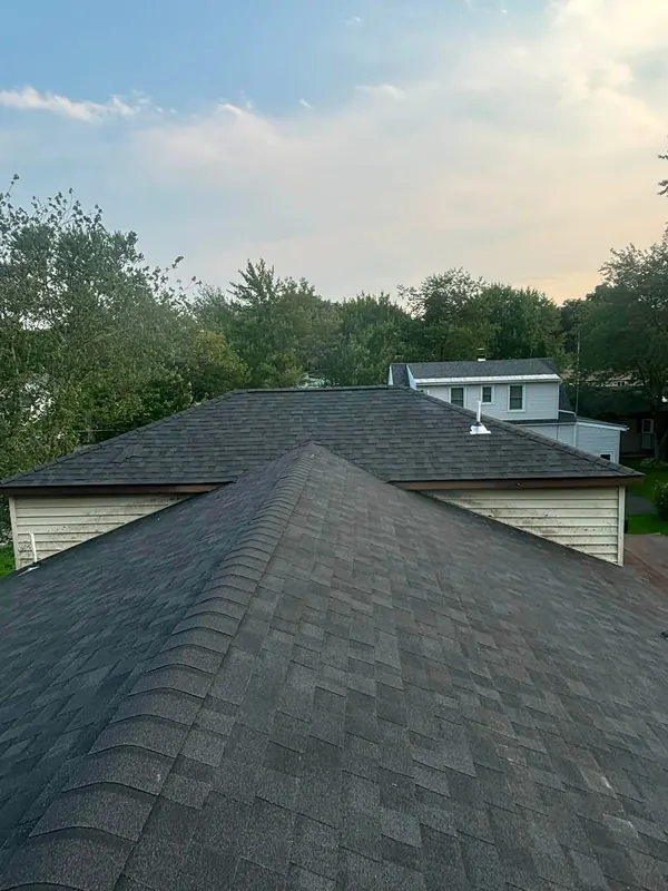 Hip roof, architectural shingles, clean ridge line