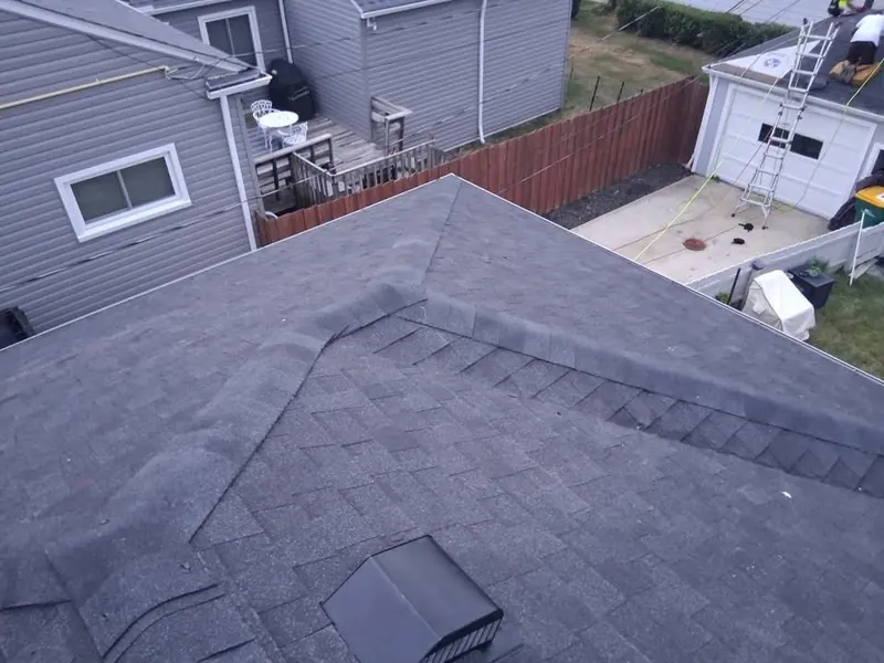 Completed shingle roof, Brooklyn backyard view